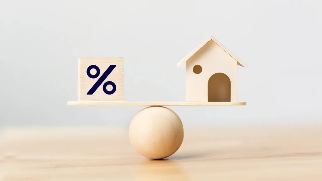 House and percentage block teetering on ball